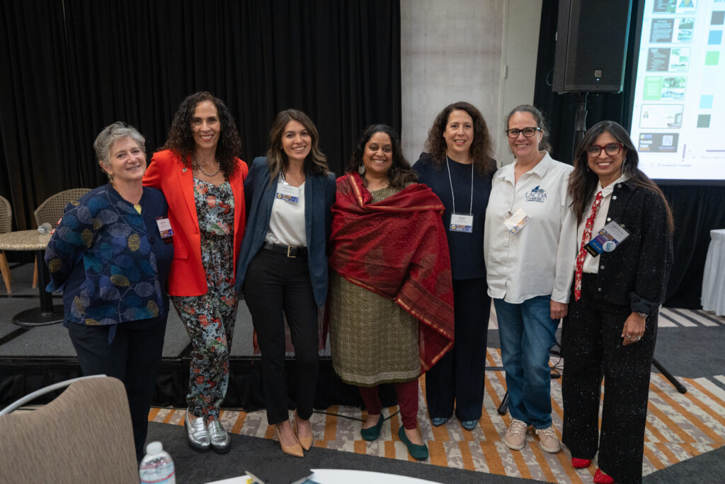 Women visionary panelists with session organizers